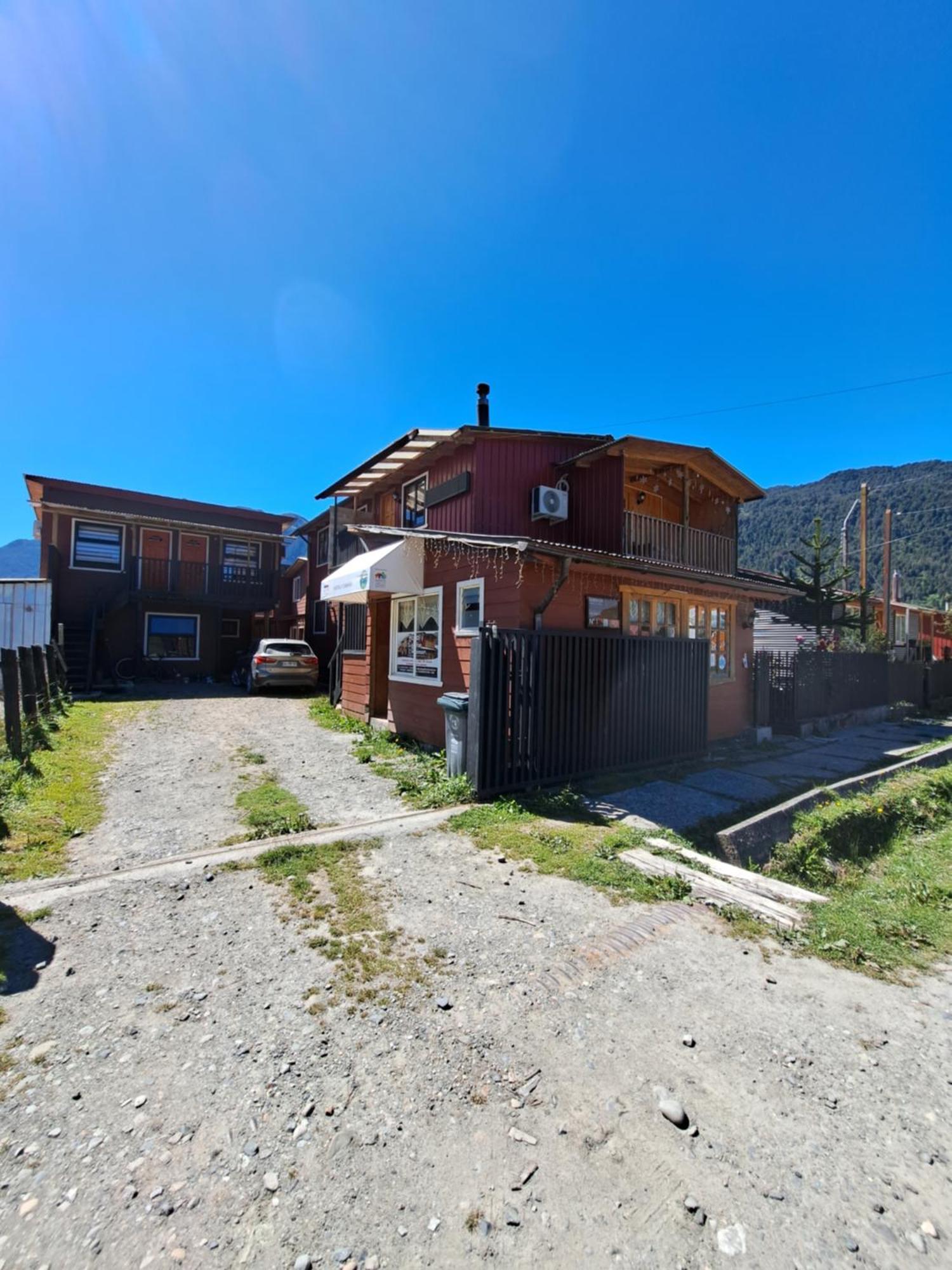 hostal y Cabañas Robinson Puerto Puyuguapi Exterior foto